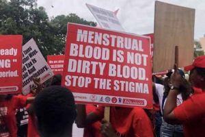 The Socialist Movement of Ghana, alongside two other groups, dons the color red as they petition Parliament to eliminate taxes on sanitary pads.